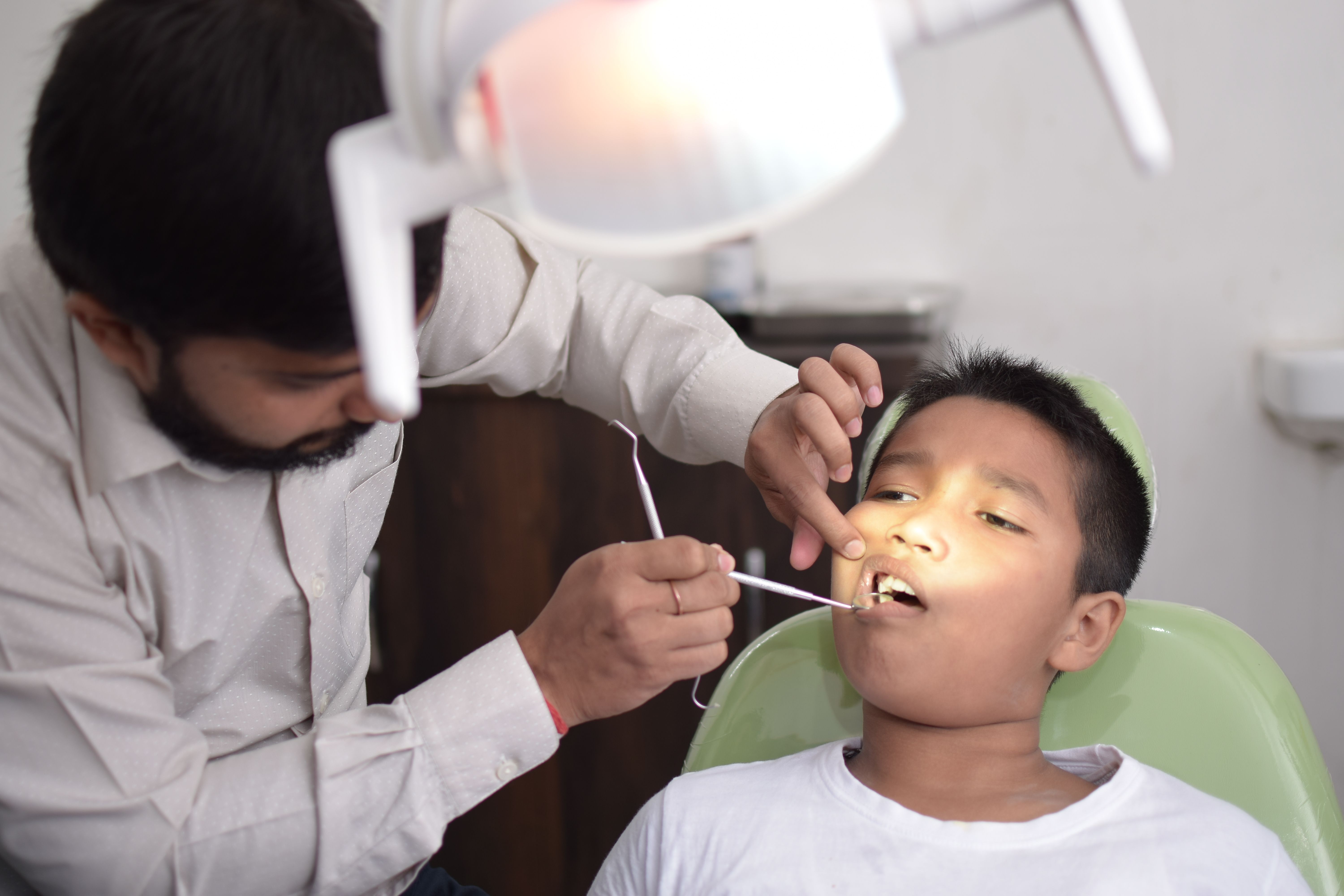 Child receiving dental care