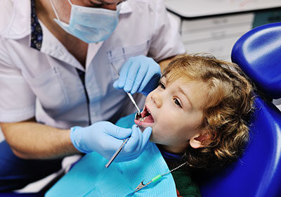 boy-in-dental-chair boy-in-dental-chair